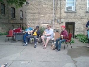 Paul Kaye, Gerald Mclendon, Jerry Zybach, and Terran Doehrer play in the backyard
